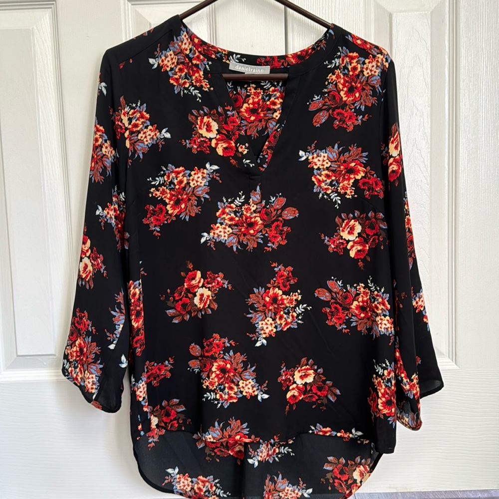 Women’s black blouse with flowers